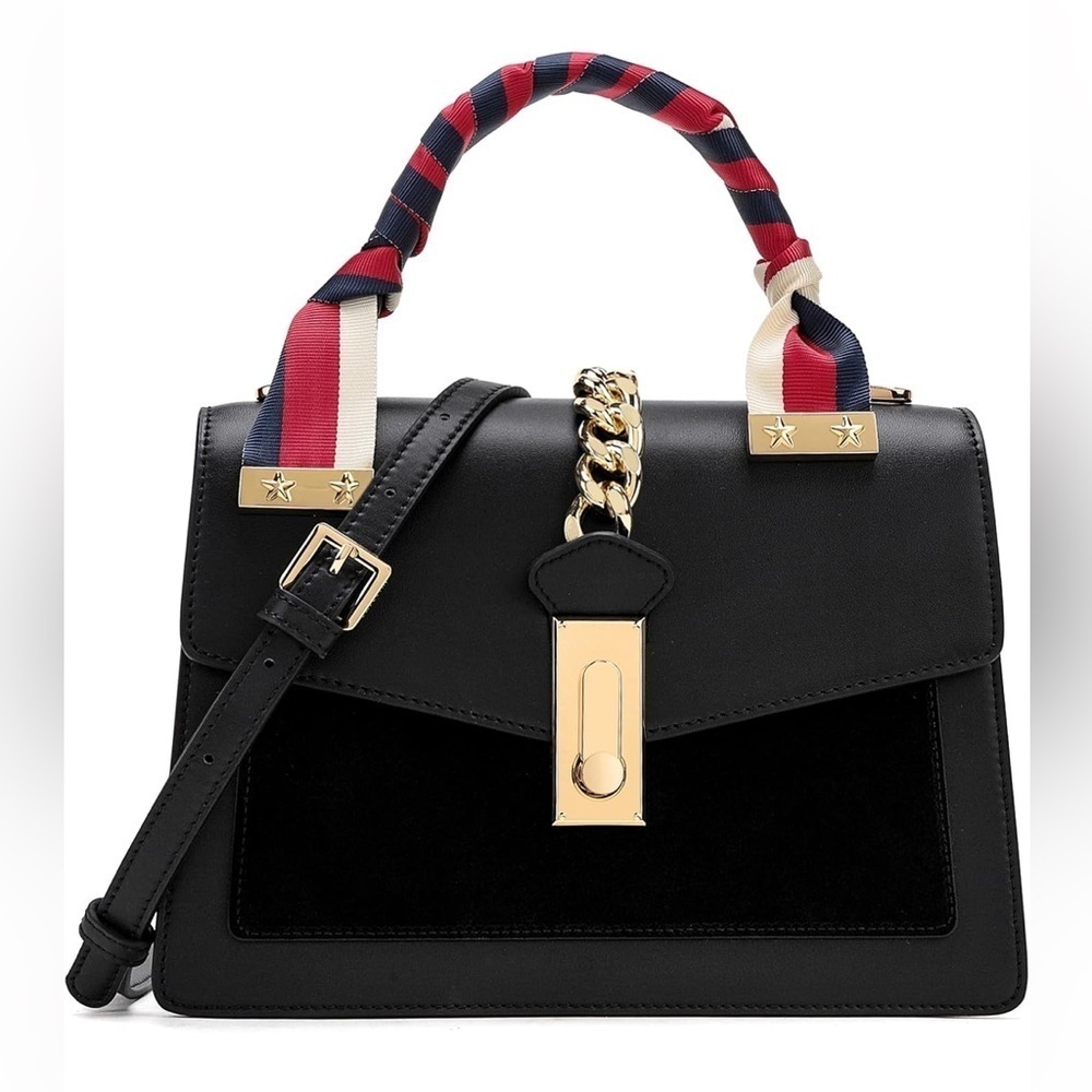 Leather top handle bag with gold hardware and crossbody strap, matching …